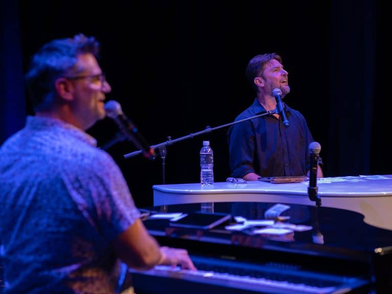 Adam and Adam with Black & White Dueling Pianos playing for the Brea Fest audience