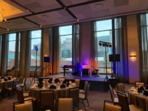 Dueling pianos show set up in hotel ballroom